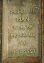 Plaque on a Scottish Gate House reads: A Merciful Man will be merciful to his beasts
